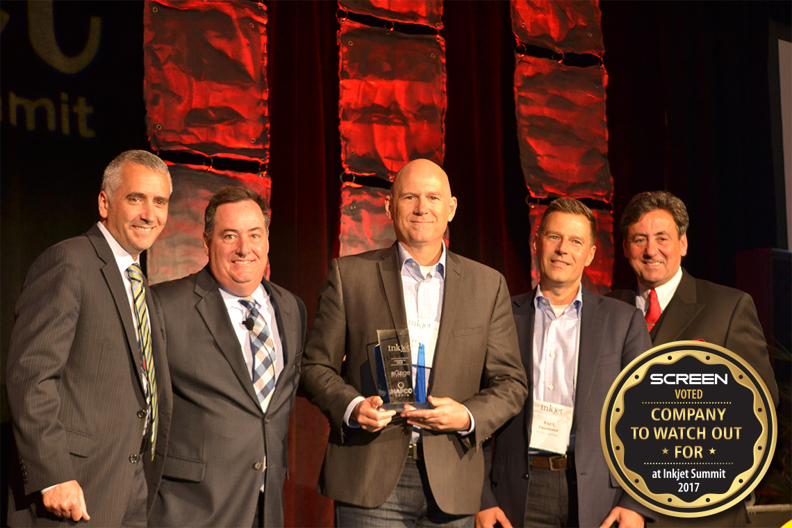 Dean Kenan (center) and Paul Chandonnet (2nd from right) of SCREEN Americas, accept the “Company to Watch Out For” award from Inkjet Summit's David Pesko, Mark Subers and Phil McKay. Photo courtesy of NAPCO Media/nGage Events